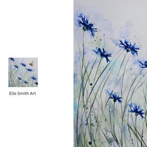 May include: Watercolor painting of blue cornflowers and green stems with a flying bee. The artwork has a soft, airy feel with splattered paint effects. The artist's name, Elle Smith Art, is visible in the corner.