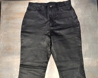 May include: Black leather pants with a straight leg fit and a high waist.