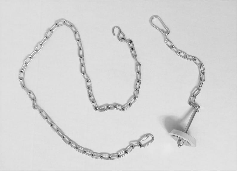 May include: A set of three silver-colored chains with various end attachments. One chain has a hook, another has a spring clip, and the third is connected to a white and silver stopper. The chains are arranged on a white background.
