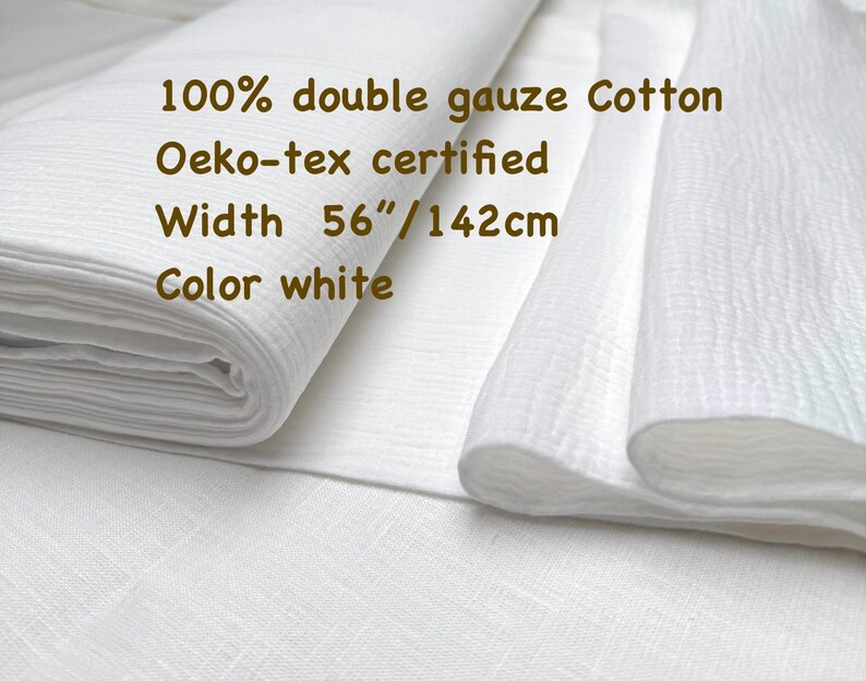 May include: White double gauze cotton fabric, Oeko-Tex certified. The fabric is 56 inches wide. The image shows a folded stack of the fabric and a portion of the fabric unfolded. The text on the image says "100% double gauze Cotton", "Oeko-tex certified", "Width 56"/142cm", and "Color white".