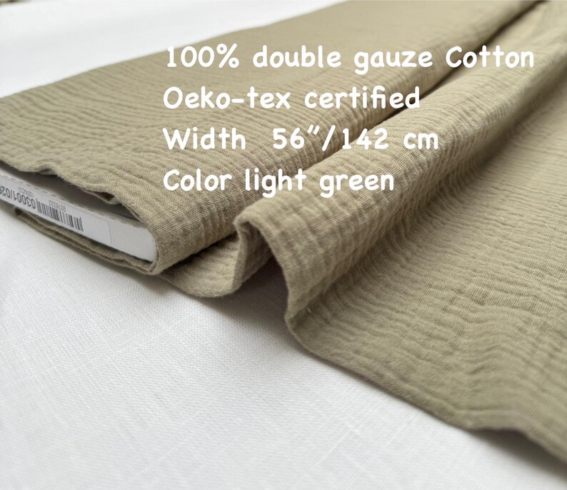 May include: Light green double gauze cotton fabric. The fabric is 56 inches wide and Oeko-tex certified. The text on the image reads: 100% double gauze Cotton, Oeko-tex certified, Width 56"/142 cm, Color light green.