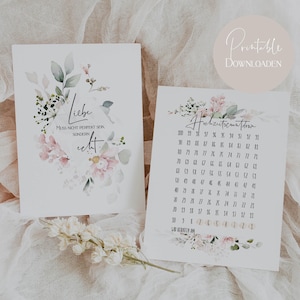 Puede incluir: Dos tarjetas imprimibles con un diseño floral. La primera tarjeta tiene el texto "Liebe muss nicht perfekt sein, sondern echt." La segunda tarjeta tiene el texto "Hochzeitsdatum" y una cuadrícula de números del 1 al 110.