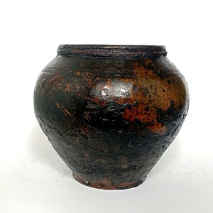 Wabi sabi pottery primitive pot. Black vintage pottery vase. Antique clay vessel