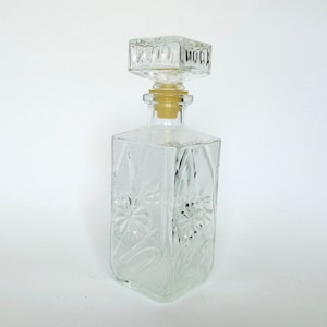 Cut crystal whiskey decanter. Vintage wine carafe with lid. Mid century textured decanter.
