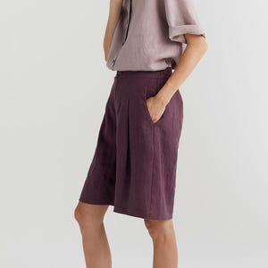 Linen Bermuda shorts for women with a knee-length and elastic waistband, loose wide leg in a minimalist style perfect summer style outfit