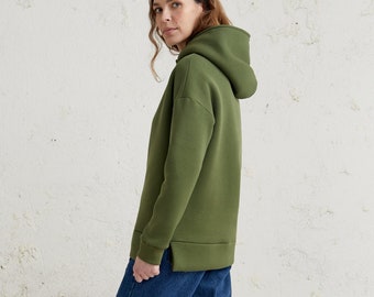 Green winter hoodie for women, cotton clothing in minimalist style perfect for spring