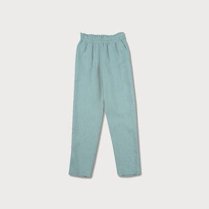 May include: Light blue linen pants with an elastic waistband.