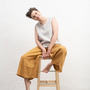 Yellow linen wide leg culottes pants for women in 70s retro style