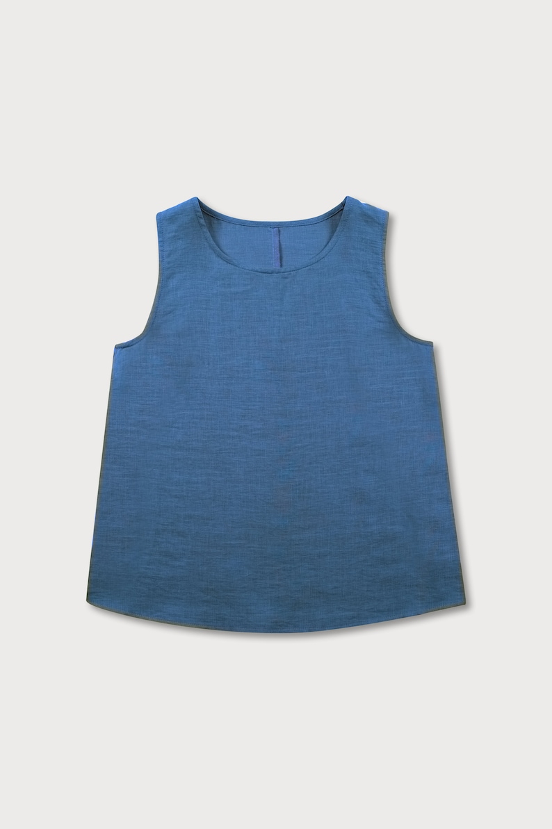 Blue linen tank top with round neckline and curved hem, flat product photo on a white background