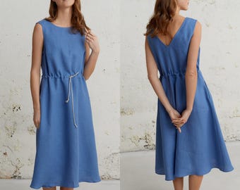 May include: A blue linen dress with a drawstring waist and a V-neck back.