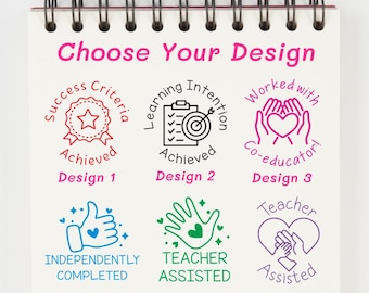 May include: A spiral-bound notepad displays six stamp designs with phrases like "Achieved" and "Teacher Assisted." The designs are in red, black, pink, and blue, with text "Choose Your Design" at the top. Each design is labeled with a number.