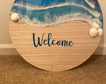 Wooden beach welcome sign