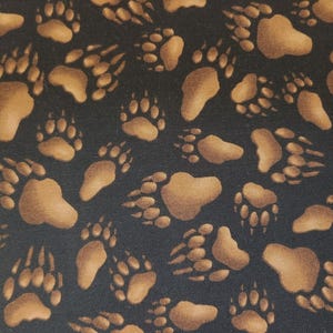 Cotton fabric cut by yard, bear paw print