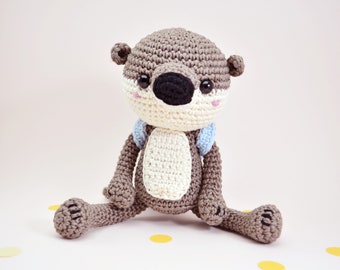 Crochet otter with a backpack, amigurumi otter