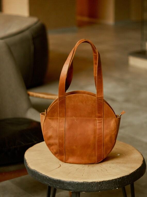 round leather tote