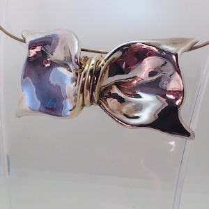 Joe Eustace 925 silver bow pendant/brooch