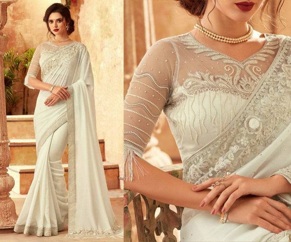 party wear saree with heavy blouse