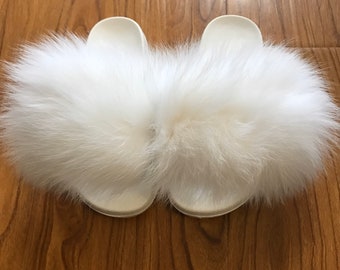 white furry sandals