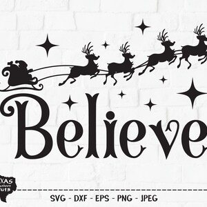 May include: Black silhouette of Santa Claus in a sleigh pulled by reindeer with the word "Believe" in a decorative font. The image is set against a white brick background.