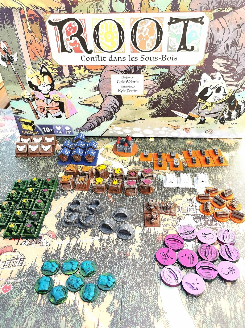 May include: A board game called "ROOT: Conflit dans les Sous-Bois" with various game pieces, including wooden buildings, tokens, and miniature figures. The game box features a cartoon illustration of a cat and a raccoon.