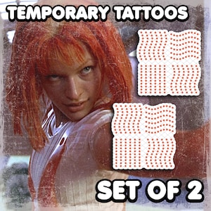 May include: Two temporary tattoos with a red dot pattern. The tattoos are on a white background and have a grid-like design. The text "SET OF 2" is below the tattoos.