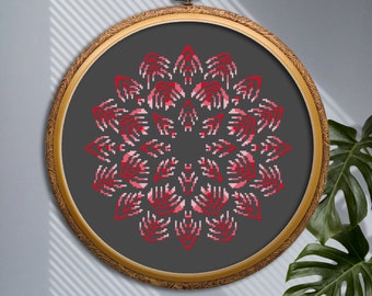 May include: An embroidered hoop featuring a red and pink mandala design on a grey background.