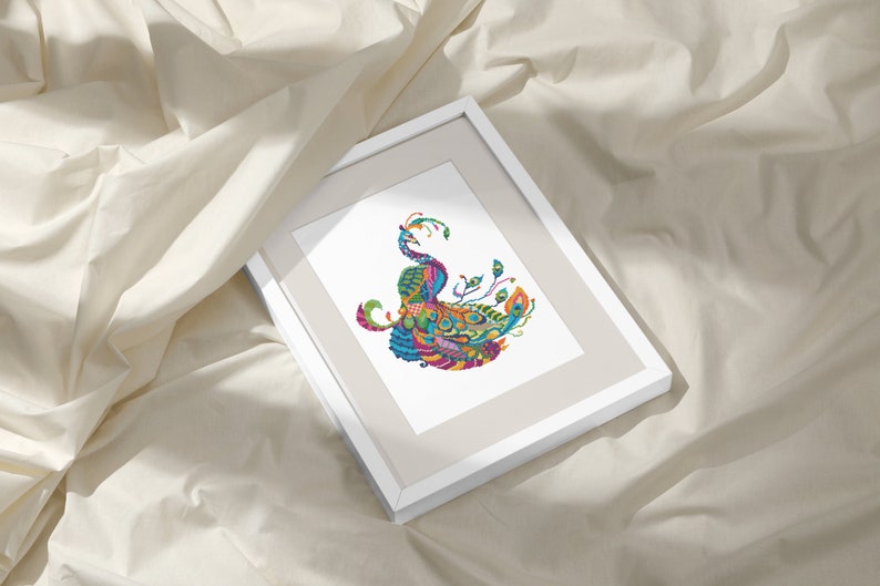 May include: A framed print of a colourful peacock with intricate details. The peacock is depicted in a vibrant array of colours, including blue, green, purple, and yellow. The print is framed in a white frame.