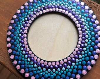 Round picture frame or ornament acrylic dot painted in wood in mandala design in Blue, Lavender and pink.