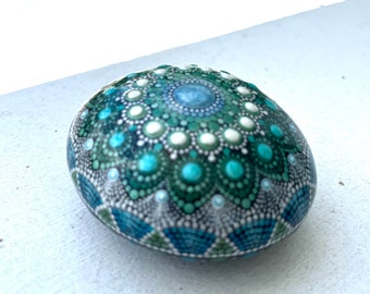 blue and white mandala dot painted natural rock