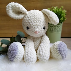 crocheted rabbit; as a music box or cuddly toy