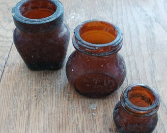 Vintage brown glass Bovril and meat paste jar x 3.