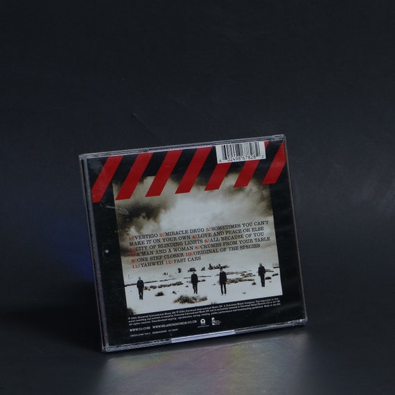 ハウ・トゥ・ディスマントル・アン・アトミック・ボム 限定盤(CD+DVD) U2、『ハウ・トゥ・ディスマントル・アン・アトミック・ボム』20