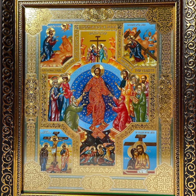 May include: A religious icon featuring a central image of a figure in red robes surrounded by other figures. The icon is framed in gold with ornate detailing and includes several smaller scenes depicting biblical events. The color palette includes blues, reds, and golds.