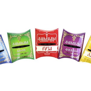 May include: Five small pillow-shaped packages of incense sticks. Each package is a different colour: blue, green, red, purple, and yellow. The packages have a gold trim and a cross design. The text on the packages reads "Фимиам" (incense) and the name of the scent in Russian: "Гардения" (gardenia), "Дфрон" (Daphne), "Роза" (rose), "Фиалка" (violet), and "Ладан" (frankincense).