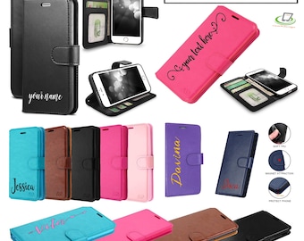 May include: A variety of personalized phone cases with different colors and designs. The cases are made of leather and have a flap that covers the screen. The cases can be customized with a name or text. The cases are shown on a white background.