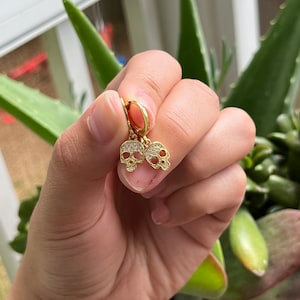 Gold Skull Huggie Hoop Earrings