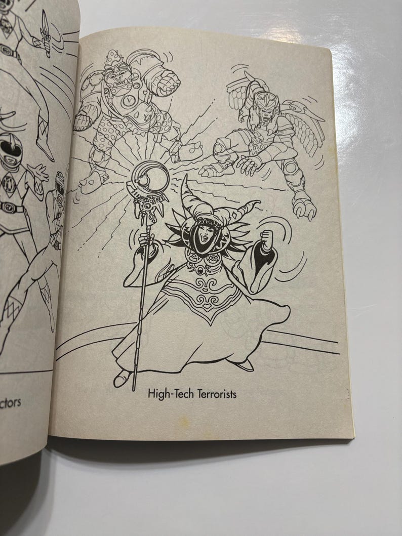 May include: Black and white line art illustration of a group of characters from the Power Rangers franchise. The characters are fighting against a group of villains. The villains are a group of high-tech terrorists. The text "High-Tech Terrorists" is written below the image.