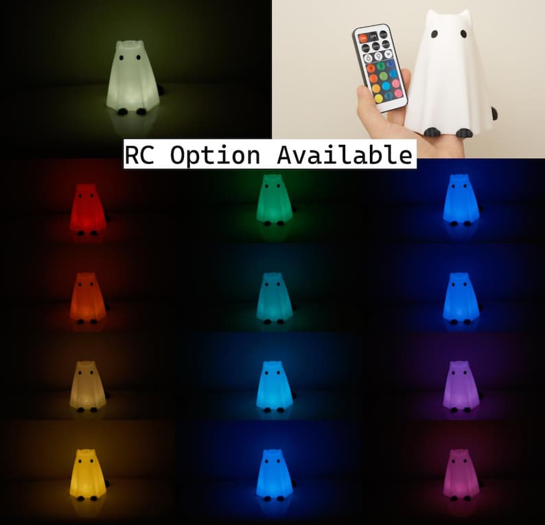 May include: A white ghost-shaped night light with a remote control. The remote control has 16 buttons for different colors, including red, green, blue, yellow, and purple. The night light is on a white surface.  RC Option Available.