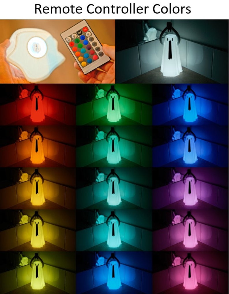 Peut inclure: Une veilleuse en forme de fant&ocirc;me blanc avec une t&eacute;l&eacute;commande offrant plusieurs options de couleurs. La lumi&egrave;re est pr&eacute;sent&eacute;e dans diff&eacute;rentes couleurs, notamment le rouge, l'orange, le jaune, le vert, le bleu, le violet et le blanc.