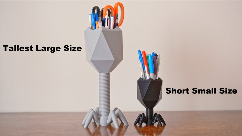 May include: Two 3D printed pen holders shaped like bacteriophages. The taller one is gray and the shorter one is black. The text "Tallest Large Size" is on the left and "Short Small Size" is on the right.