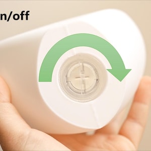 May include: White diffuser with a twist on/off mechanism. The diffuser has a circular opening with a clear plastic insert. To turn the diffuser on or off, twist the clear plastic insert clockwise or counterclockwise.