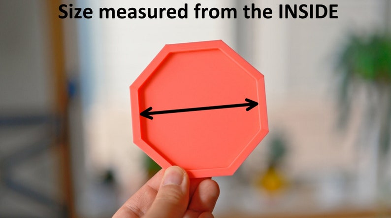 May include: A bright red octagonal silicone mold with a black arrow pointing to the inside diameter.  Size measured from the INSIDE.