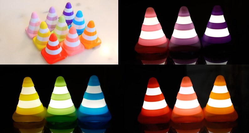 Op de afbeelding: Set van negen kleurrijke verkeerskegelvormige nachtlampjes. De kegels zijn in verschillende kleuren, waaronder roze, paars, geel, groen, blauw, oranje en rood. Elke kegel heeft witte strepen en een wit licht dat de kegel verlicht.