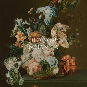 May include: A vintage still life painting depicting a bouquet of flowers arranged in a glass vase with a gold rim. The flowers include tulips, irises, roses, and carnations in shades of pink, white, red, and blue. The painting is titled "BLOSSOM BOTANICA".