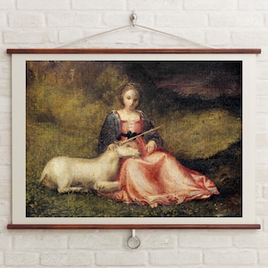 May include: A framed print of a Renaissance painting depicting a woman in a red dress and blue top seated next to a white unicorn. The artwork is displayed on a wooden scroll frame.