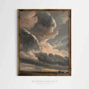 May include: A framed painting of a dramatic sky with large, fluffy clouds in shades of gray, white, and pink. The clouds are illuminated by a warm, golden light, creating a sense of depth and movement. The horizon is visible in the distance, with a hint of green foliage.