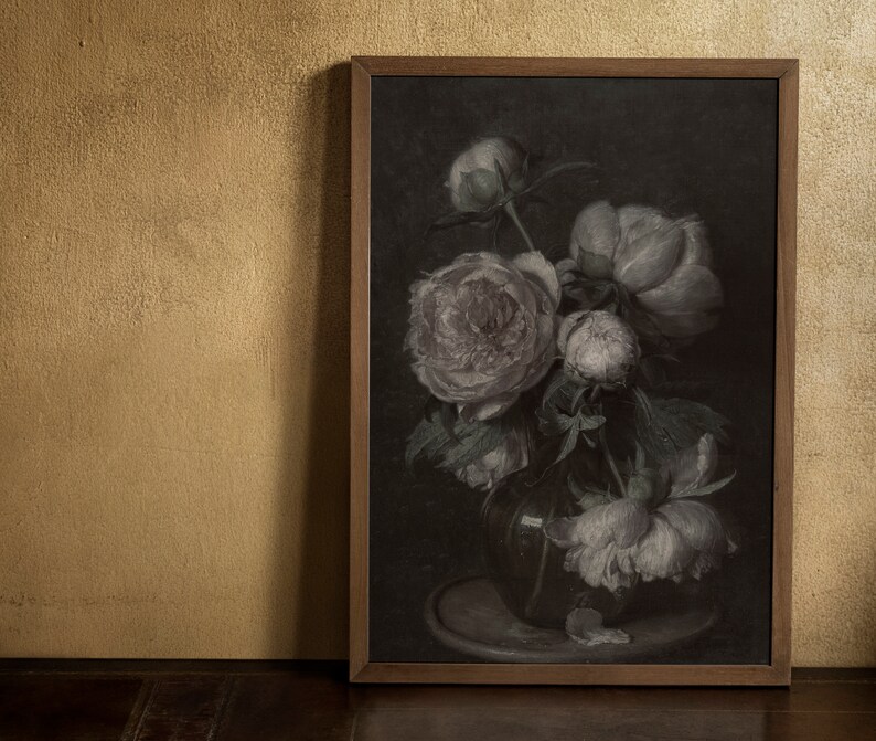 May include: A framed painting of a bouquet of white peonies in a dark brown vase. The flowers are arranged in a loose, natural style, and the background is a dark, almost black, color. The painting is framed in a simple, dark brown frame.