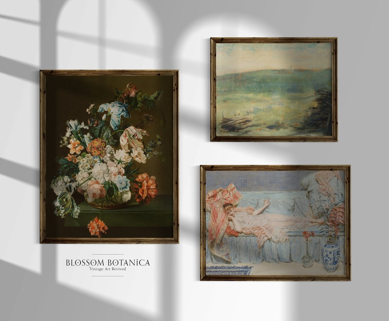 May include: Three framed vintage art prints. The first print features a still life of colourful flowers in a vase. The second print shows a landscape scene with a green hill and a blue sky. The third print depicts a woman reclining on a couch with a blue and white patterned fabric.