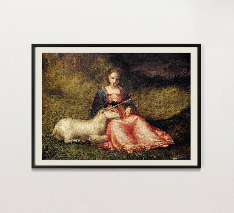 May include: Framed artwork featuring a Renaissance-style painting. A woman in a red dress and blue shawl sits with a white unicorn in a grassy field. The painting has a dark, textured background and is enclosed in a black frame.
