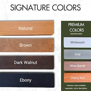 a collection of different colored hardwood planks, each labeled with its corresponding color. The planks are arranged in a row, with the natural color being the first, followed by the premium colors: Premium colors available separately, link in description.